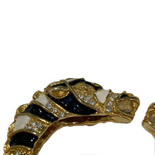 Load image into Gallery viewer, Signed Kenneth J Lane "KJL" Gold Toned Black & White Enamel & Clear Crystal Rhinestone Rams Head Clamper Bangle