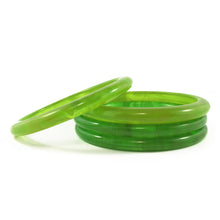 Load image into Gallery viewer, Rounded Edge Bakelite Spacer Bangles c.1950's - Clear Marbled Apple