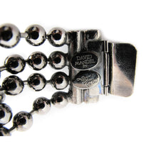Load image into Gallery viewer, Signed 'David Mandel for The Show Must Go On' Crystal and Chrome Cross Bracelet