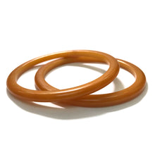 Load image into Gallery viewer, Rounded Edge Bakelite Spacer Bangles c.1950&#39;s - Butterscotch