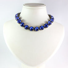 Load image into Gallery viewer, Harlequin Market Large Austrian Crystal Accent Necklace - Sapphire Blue - Antique Gold Plating