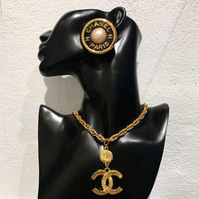 Load image into Gallery viewer, Chanel Vintage Large Round CHANEL PARIS CC Black Gold Faux Pearl Earrings c. 1990 (Clip-on) - Harlequin Market