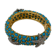 Load image into Gallery viewer, Signed Kenneth J Lane &quot;KJL&quot; Gold Toned Blue Cabochon &amp; Clear Crystal Star Fish Clamper Bangle