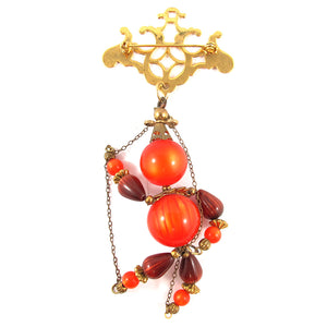 Vintage Beads Reassembled in the Form of a Puppet Brooch