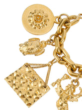 Load image into Gallery viewer, Vintage Chanel Iconic Gold Tone 7 Charm Bracelet c. 1980