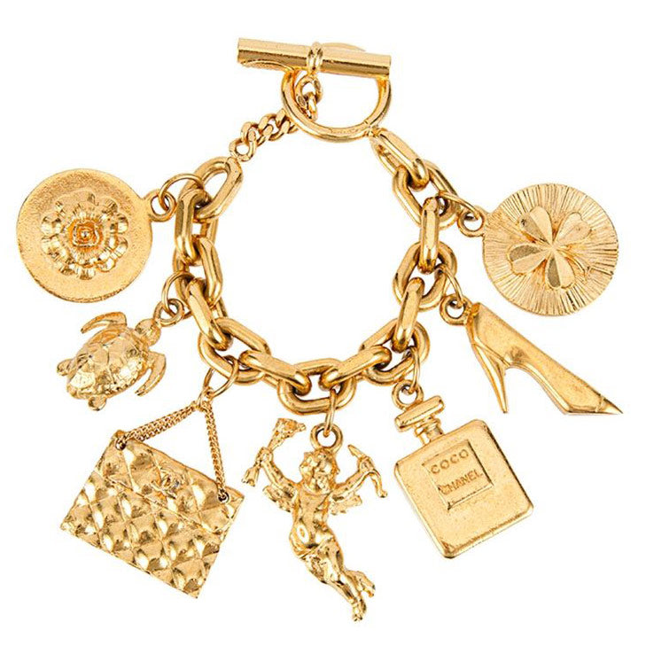 Vintage Chanel Iconic Gold Tone 7 Charm Bracelet c. 1980