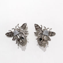 Load image into Gallery viewer, Ciner NY Chrome 100th Anniversary Bee Earrings with Clear Eyes (Clip-on) - Harlequin Market