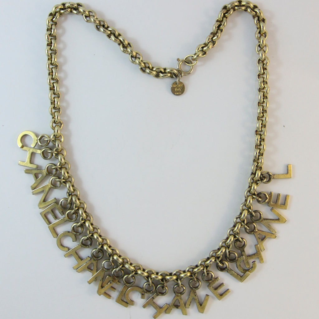 Signed Chanel Vintage Bronze Tone Charm Necklace c. 1970s