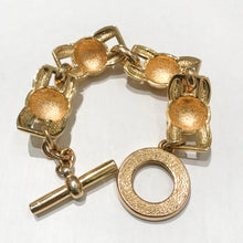 Load image into Gallery viewer, Vintage Signed Gold Tone &quot;Celine Paris&quot; Etched Chain Link Toggle Bracelet c.1990s